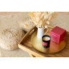 Массажная свеча Womanizer, 155 г, Scented Candle с ароматом белого чая, фото №5 — секс шоп Украина, NO TABOO