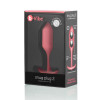 Анальная пробка со смещенным центром тяжести B-Vibe Snug Plug 2, силиконовая, коралловая, 10.5 х 3 см фото №2 — секс игрушки: Украина, NO TABOO
