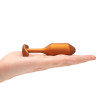 Анальная пробка с утяжелением размер M, B-Vibe Snug Plug 2, оранжевая, 10.5 х 3 см фото №7 — секс игрушки: Украина, NO TABOO