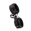Наручники на цепочке Dreamtoys Blaze с фиолетовым тиснением, чёрные, 40 х 5 см, фото №1 — секс шоп Украина, NO TABOO
