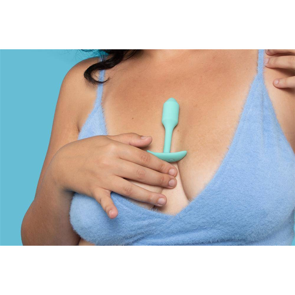 Анальная пробка со смещенным центром тяжести, S, B-vibe Snug Plug 1 мятная, 8.6 х 2.2 см фото №8 — секс игрушки: Украина, NO TABOO