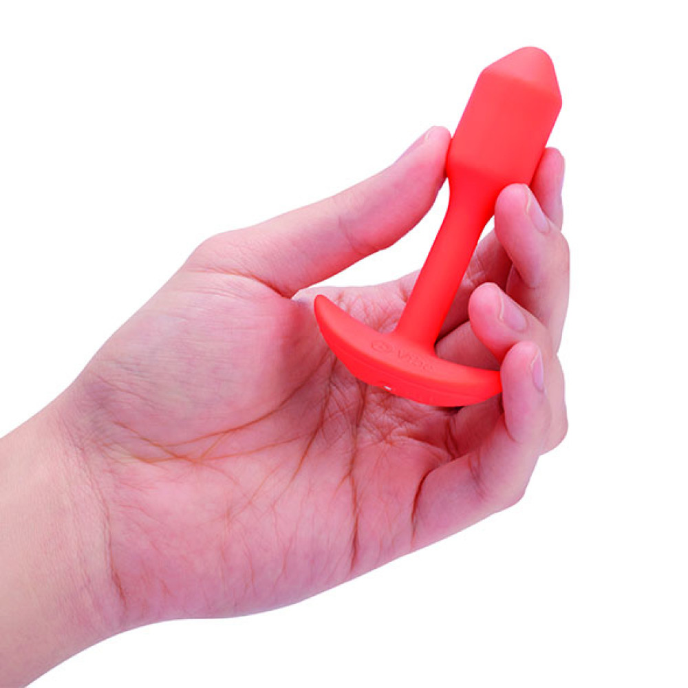 Анальна пробка с вибрацией размер S B-Vibe Vibrating Snug Plug 1, оранжевая фото №5 — секс игрушки: Украина, NO TABOO